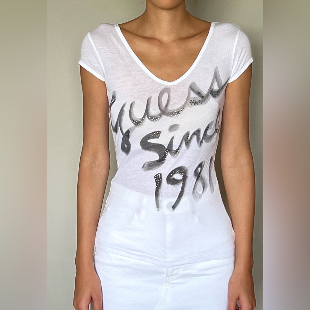 Guess white logo top in small.